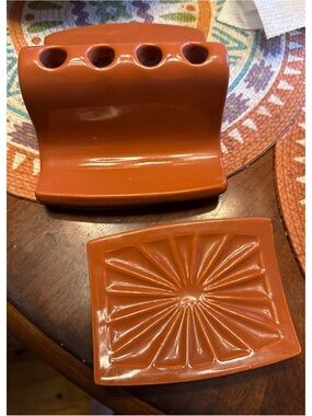 vintage Royal Haeger ceramic bathroom accessories in a terra-cotta peach glaze